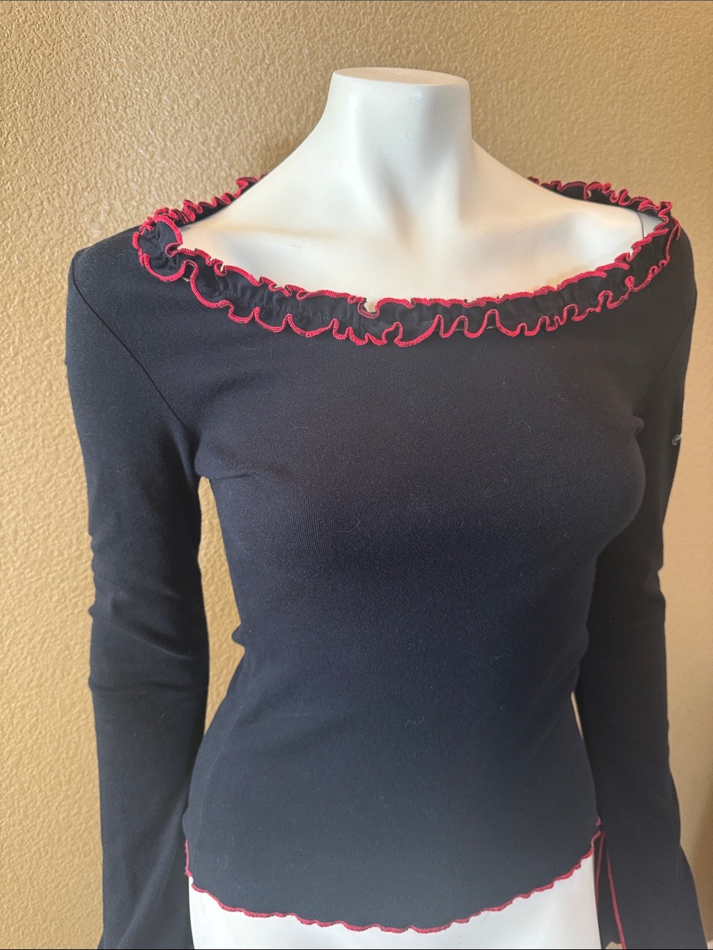 Black Long Sleeve Ruffle Neck Top with Red Trim